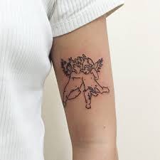 Angel whispering in ear tattoo. Whispering Angels By Suki Lune Tattoogrid Net