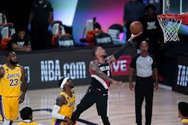 Portland trail blazers forward robert covington save the basketball from heading out of bounds by passing it back court as cleveland cavaliers forward kevin love defends in the first half, may 5, 2021, at rocket mortgage. Nba Damian Lillard Scores 34 As Portland Trail Blazers Beat Lebron James La Lakers