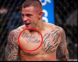 This tattoo consists of three small and colorful butterflies along with the name jonathan. Dustin Poirier S 27 Tattoos Their Meanings Body Art Guru