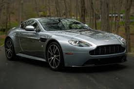 Image result for Titanium Silver 2014 Aston Martin