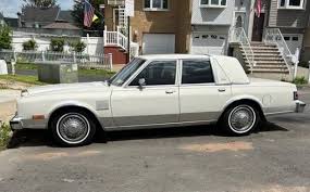 Image result for White 1985 Chrysler