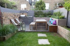 Low Maintenance Child Friendly Firemagic Outdoor Kitchen Garden Design With Vegetable Garden Built In Garden Seating Small Garden Design Garden Seating Area