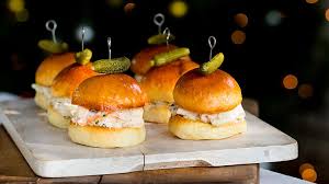 Marinated seafood salad is always served as our first course during our christmas eve dinner, known as the feast of seven fishes! Lobster Rolls L Seafood Christmas Recipes Sbs Food