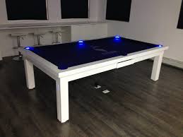 Matching benches with soft, padded seat cushions provide a luxurious place to take a break. Cloud 9 Billiards Table