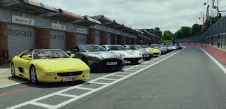 Watch Gordon Ramsay Take A Dozen Of His Hottest Cars To The Track Hot Cars Car Collection Gordon Ramsay