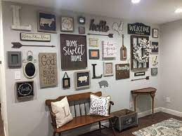 It started with renting scaffolding that i practically lived on for a this view of our new modern farmhouse living room, from the kitchen, makes me want to pinch myself. Rustic Gallery Wall Ideas Photo Displays Https Silahsilah Com Design Rustic Gallery Wall Rustic Gallery Wall Gallery Wall Living Room Wall Decor Living Room
