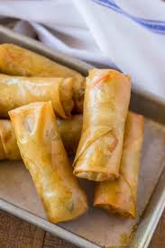 Take a single dry rice spring roll wrapper and place it in the bowl of lukewarm warm water. Spring Rolls Dinner Then Dessert
