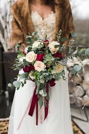 Wedding bouquets are often our favorite style element of a brides ensemble. Rustic Romantic Inspiration Rustic Wedding Chic Red Bouquet Wedding Peach Bouquet Winter Wedding Flowers