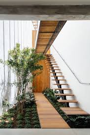 Galeria De Loja Acola Vao 13 Stairs Design Interior Garden Interior Architecture Design