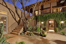 Southwest Interior Courtyard This Is A Beautiful Example Of A Two Story Interior Courtyard Garden Architecture Exterior Spanish Style Homes Dark House