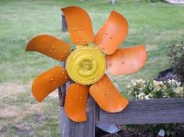 Fan Blade Gets A New Life Upcycled Garden Style Recycled Garden Art Recycled Garden Upcycle Garden