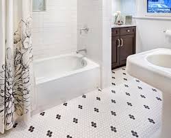 The tiles are cut into elongated rectangles and laid in a herringbone pattern for added style. Vintage Style Black And White Bathroom Floor Tile Novocom Top