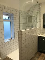 Our New Bathroom With Metro Subway Tiles And Dark Grey Grouting With Contrast Penny Tiles For The S Bathroom Windows In Shower Window In Shower Shower Cubicles
