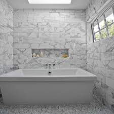 It's timeless, sophisticated, and versatile to decorate with. Carrara Marble Tile Bathroom Design Ideas