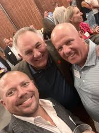 Barnhill Contracting Company's Red, White and 75! John Mancuso and Nicholas  Tribble congratulated Valerie Bono and Barnhill