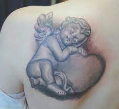 Nur yüzlü kimse, nurtopu gibi çocuk. 35 Cherub Tattoos With Spiritual Connections And Meanings Tattooswin