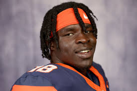 Syracuse linebacker worked 3 jobs to make football dream come true: 'It was  a test from God'