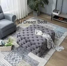 A cotton or fabric pouffe might be more suitable for creating a soft and cozy extension of your sofa by adding a comfy footrest. Chesterfield Pouffe Seating Footstool Coffee Table Sj Dream Beds