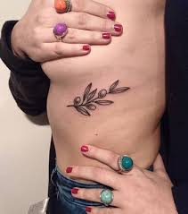 Small And Girly Olive Branch Tattoo On The Left Rib Cage Olive Branch Tattoo Greek Tattoos Branch Tattoo