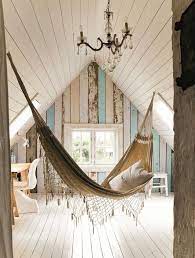 My sister used to have a chair similar to this in her bedroom at my parents' house, and it was the comfiest place to sit and read. How To Use An Interior Hammock In Your Bedroom