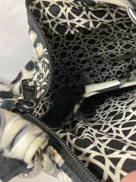 Maybe you would like to learn more about one of these? Vera Bradley Black White Floral Crossbody Bag Gem