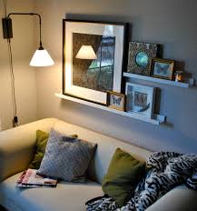 Design a hanging piece out of pastel yarn and a wood dowel. Small Living Room Wall Shelf Decor Ideas