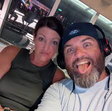 Why was John laughing hysterically when Travis Scott arrived?