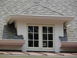 We removed the old copper gutters and installed new ones. Falcon Roofing Affordable Roofing Skylights Gutters Attic Fans Arlington Fairfax Virginia
