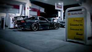 Maybe you would like to learn more about one of these? Hd Wallpaper Mazda Rx 7 Car Gas Station Wallpaper Flare