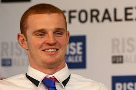 Alex McKinnon stands after spinal injury