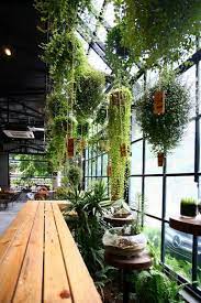 Get inspired by clever plants and flowers in these garden designs. 20 Faulous Restaurant Interior For You To Make An Interesting Inspiration Interiors Interiordesign Interiordesignideas Indoor Garden Plants Garden Cafe