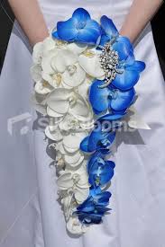 This Ivory And Blue Cascading Bridal Bouquet Is Made With Realistic Phalaenopsi Blue Wedding Bouquet Flower Bouquet Wedding Cascading Bridal Bouquets
