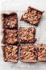 Classic southern pecan pie bars with a touch of cocoa in the crust, a layer of melted chocolate, salted and roasted pecans, and a splash of bourbon in the filling. Chocolate Pecan Pie Bars Recipe Williams Sonoma Taste