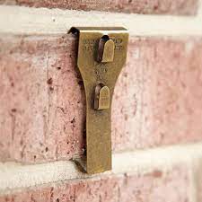 Hanging Pictures On Brick Wall How To Hang Tools Guide Brick Clips Brick Wall Exposed Brick Walls