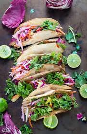 Sweet kale fish tacos are loaded with nutritious veggies. Asian Tilapia And Kale Slaw Tacos