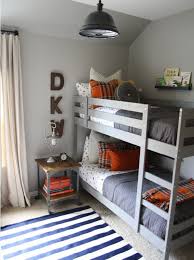 Give the deep blue bed a cute and cool pop of color with funky neon hairpin legs. Toddler Boy Room Ideas