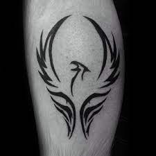 Wavy tribal tattoo design ideal for men. 40 Tribal Phoenix Tattoo Designs For Men Mythology Ink Ideas Tribal Phoenix Tattoo Arm Tattoos For Guys Simple Tattoo Designs