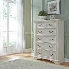 There's a drawer with ball bearing guides and protective drawer liners and a lower wire shelf for extra storage. The Bayside Cottage Collection Chest Miami Direct Furniture