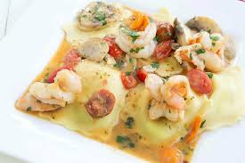 Ricotta And Spinach Ravioli Topped With Shrimp In A Scampi Sauce Delicious Seafood Recipes Cooking Seafood Ravioli Recipe