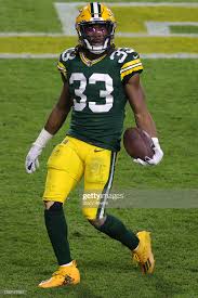 As he has done for most of the past. Running Back Aaron Jones Of The Green Bay Packers Celebrates After Green Bay Packers Wallpaper Packers Green Bay Packers
