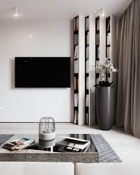 Find out all photos and details of appartement contemporain, france on archilovers. Appartement Design Moderne Amenagement Idee Bibliotheque Moderne Table Basse Salon Tapis De Sol Gris Deco Fleurs Interior Contemporary Interior Shelving Design