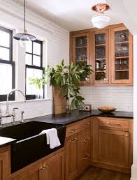 Install a granite tile floor in your kitchen for an upscale look. How To Decorate With Black Tile Colour In Tiles