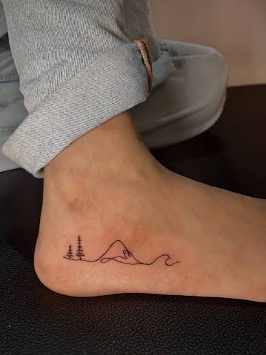From the peaks to the tides, carry the journey with you. ✓#post . . . . . #MinimalistTattoo #FineLineTattoo #NatureTattoo …