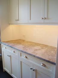 Cherry and mahogany cabinets bring out. Moonlight Granite Counters Design Ideas