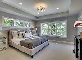 Track lighting is more often used in the living room or kitchen than in the bedroom, but it can have a great dramatic effect when used to spotlight artwork, as in this contemporary bedroom from sak designs. Bedroom Lighting Ideas 9 Picks Bob Vila