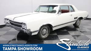 1965 oldsmobile cutlass streetside classics the nation s trusted classic car consignment dealer 1965 oldsmobile cutlass streetside