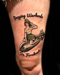 Image result for quirky pylon forehead tattoo