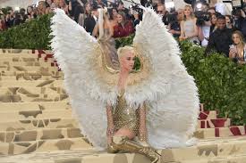 It clearly is over katy perry's body. Met Gala 2019 Jennifer Lopez Walked In On Katy Perry Dressing Up As A Burger At The Met Gala