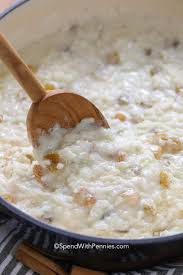 Creamy Rice Pudding Is Made With Cooked Rice And Milk Then Flavour Infused With Sugar Raisins Cinnamon Creamy Rice Pudding Creamy Rice Stovetop Rice Pudding