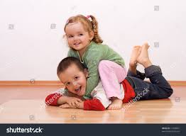 Happy Brother Sister Playing Wrestling On Stock Photo 11349841 |  Shutterstock